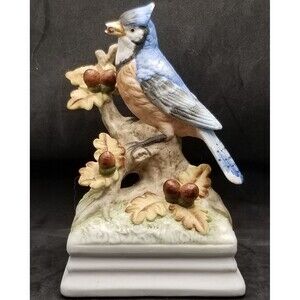 vintage Gorham porcelain music box featuring a blue jay plays The Entertainer